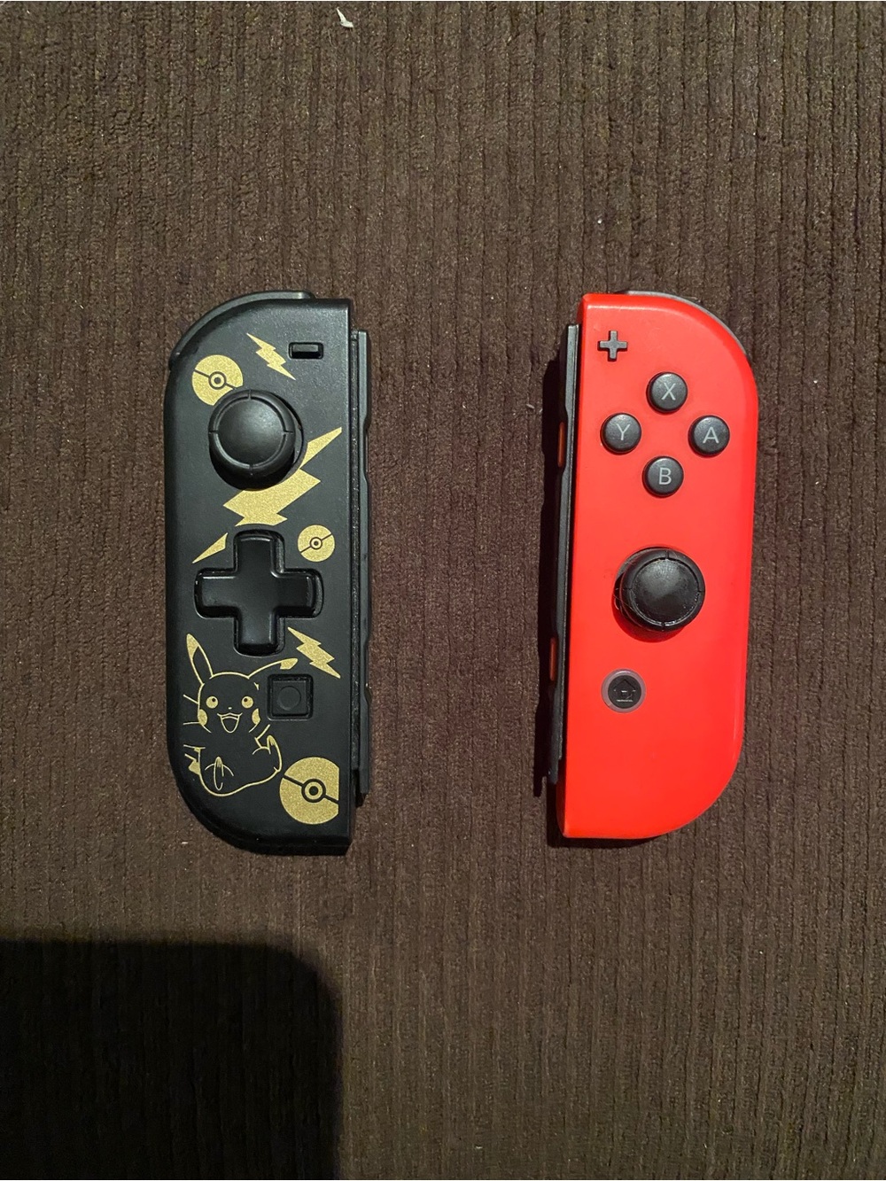 Nintendo Switch Pikachu left handed controller and original right side.